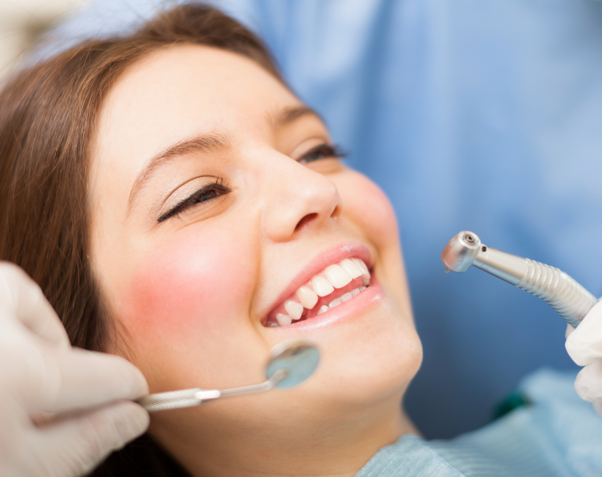 Smiling patient during a dental visit at Star Dental, NE Calgary