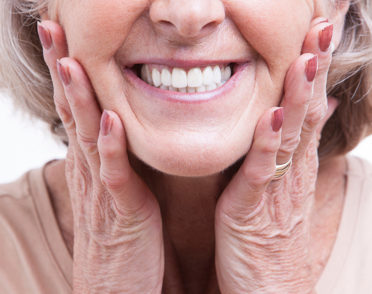 Smiling patient with a full, natural-looking smile